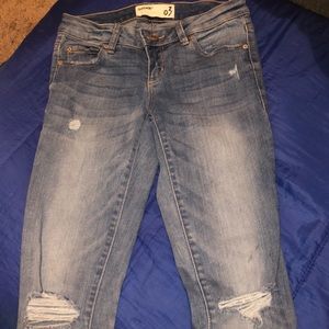 Garage skinny jeans with holes at knees